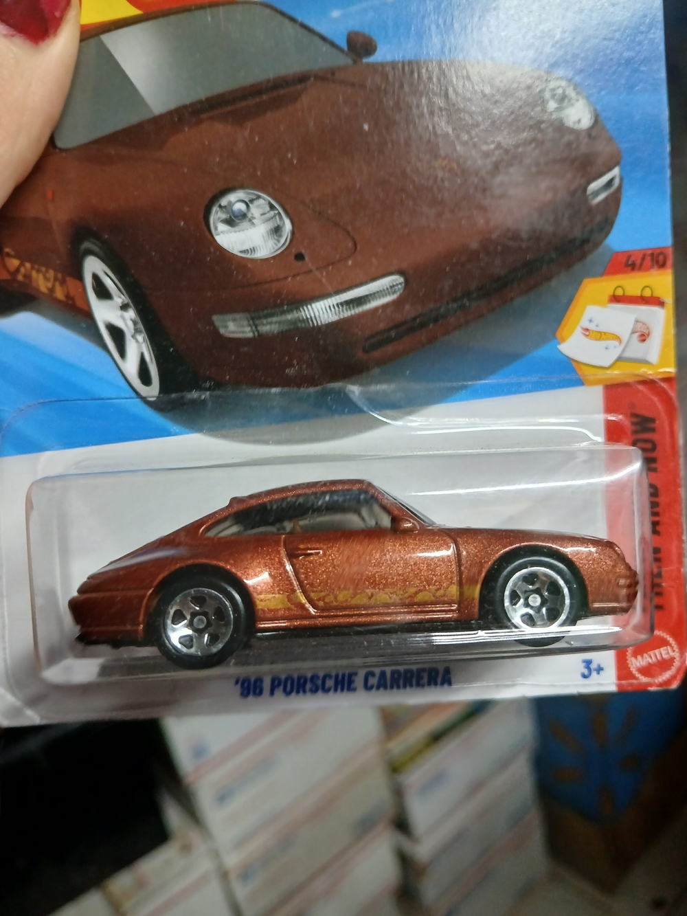 factory-sealed Hot Wheels '96 Porsche Carrera in metallic brown